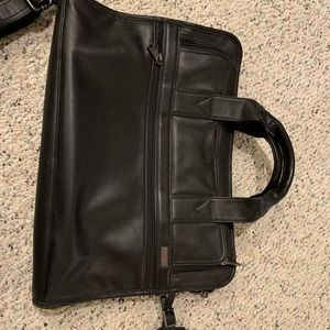 Tumi briefcase in a Napa black leather finish.